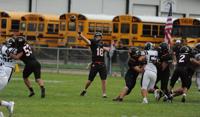 View Tyson Pavlik throws 5 touchdown passes as Manhattan routs Anaconda to begin title defense