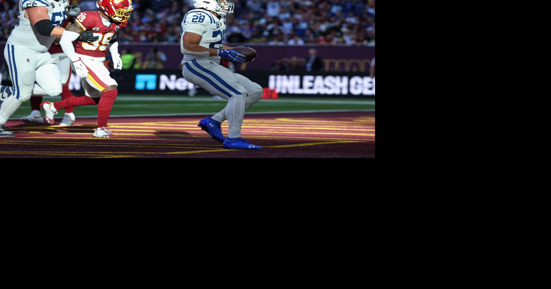 Taylor runs for 2 TDs and Colts beat Commanders 30-13 in London