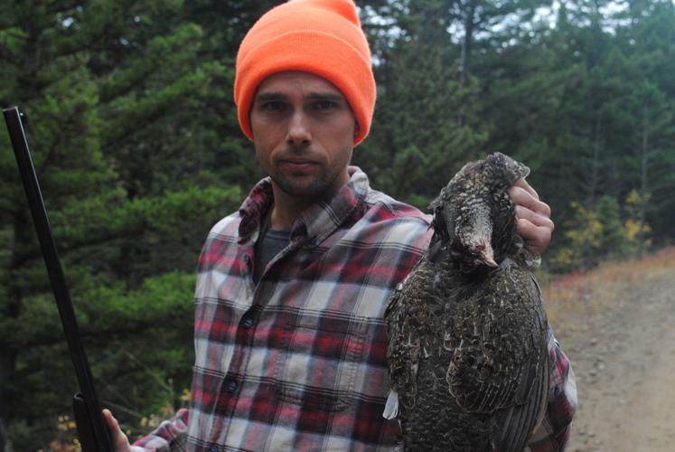 Giving it a shot Satisfaction after a day of grouse hunting near