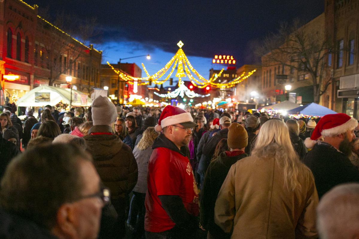 Santa goes strolling Thousands gather downtown for annual Christmas