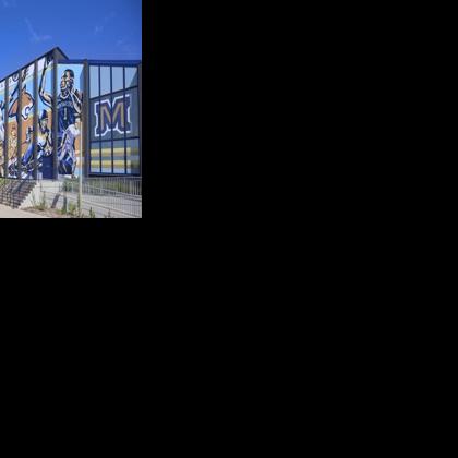 Montana State’s Robert Rath designs large-scale mural outside Shroyer Gym to celebrate athletic success