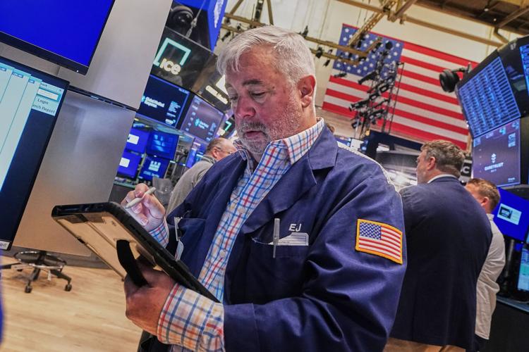 Tech carries Wall Street to records, even as most stocks fall after ...