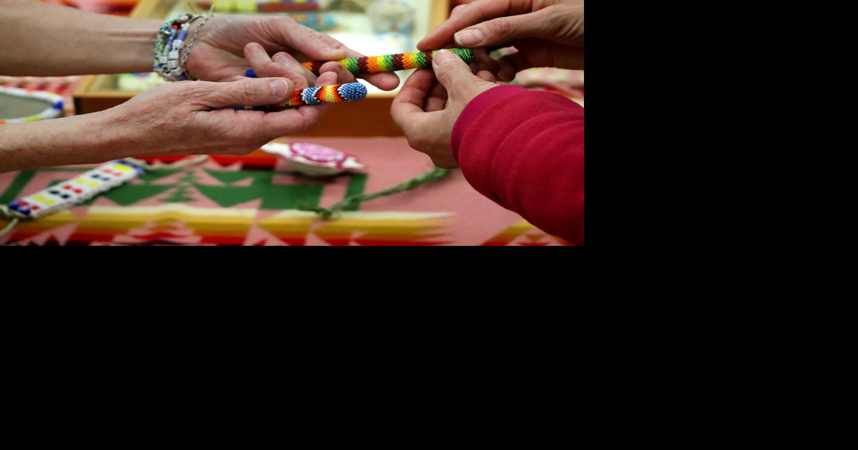 Attendees at a Museum of the Rockies workshop studied tribal artistry and practiced traditional techniques by crafting handmade jewelry.