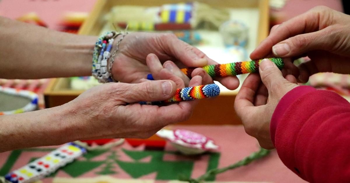 Attendees at a Museum of the Rockies workshop studied tribal artistry and practiced traditional techniques by crafting handmade jewelry.