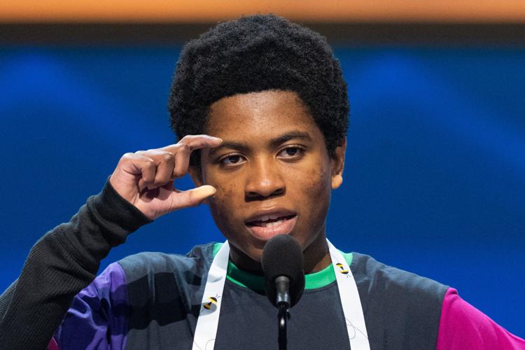 Photos of students competing for the Scripps National Spelling Bee ...