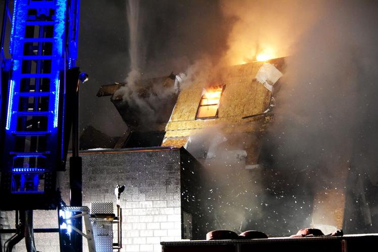 Fire torches fourstory apartment building under construction in