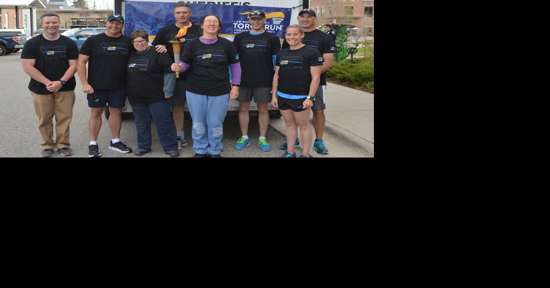 Special Olympics athletes, law enforcement bond through torch run ...