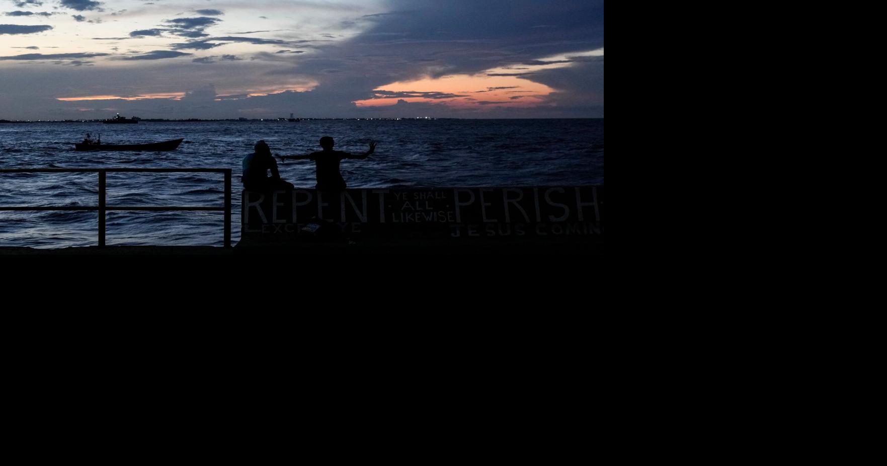 A ferry carrying 116 people capsizes off Guyana, with 67 rescued as search continues