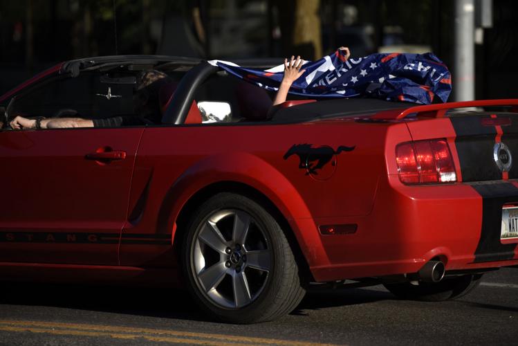 'Defend the Police' demonstrators clash with counter protesters at car ...