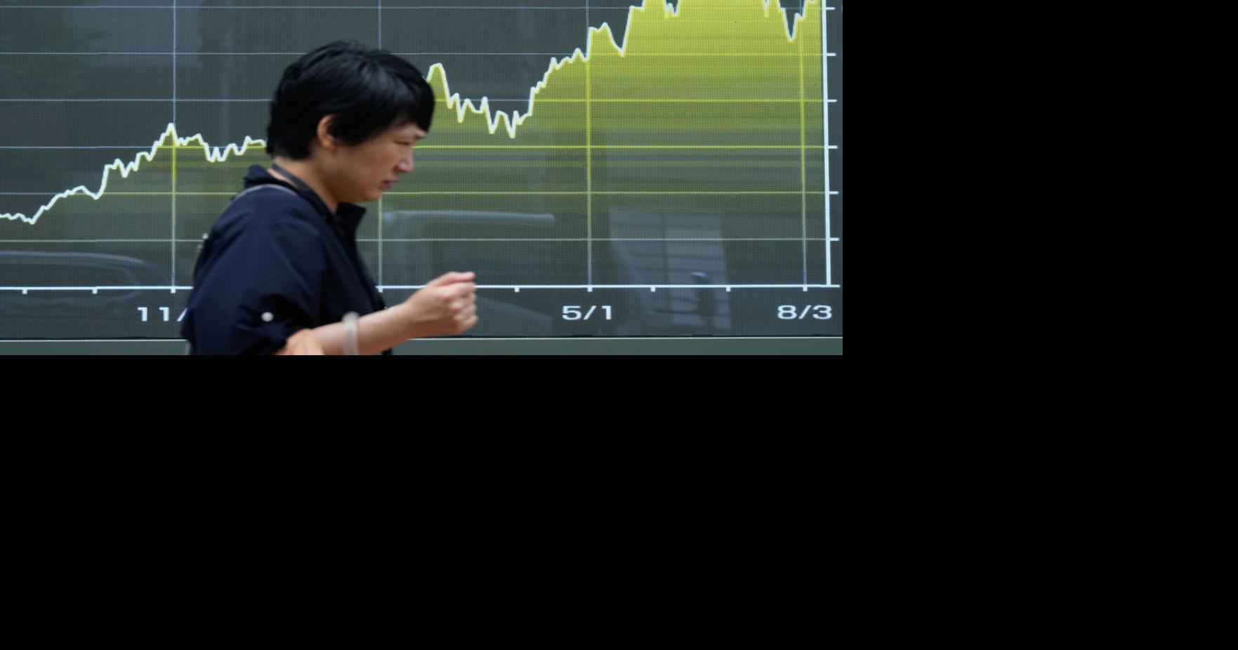 Asian shares are mostly higher while US futures and oil prices hold steady