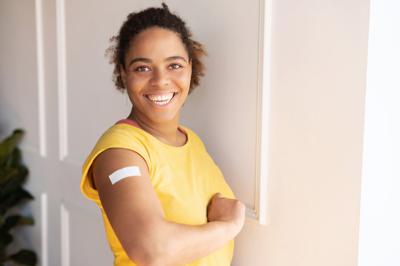 woman showing arm with medical patch