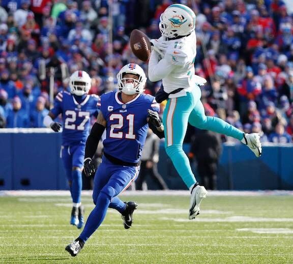 Bills hang on for 34-31 wild-card win over Dolphins – The Denver Post