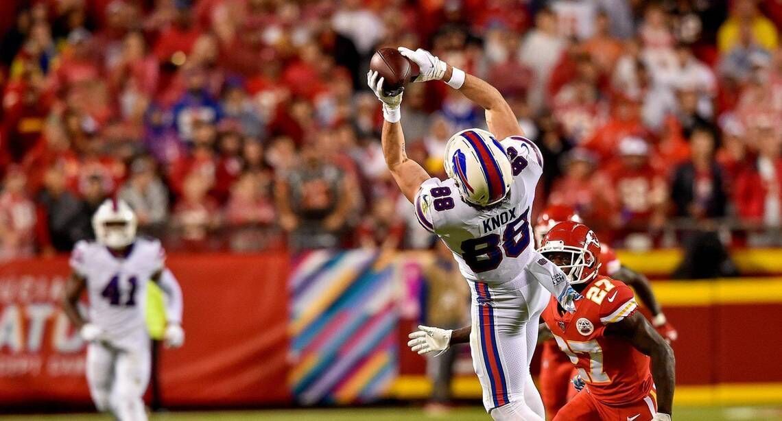 Dawson Knox of the Buffalo Bills catches a pass in front of Justin