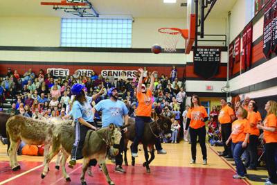 Burro Ed Over Fretz Team Triumphs In Donkey Basketball Tournament