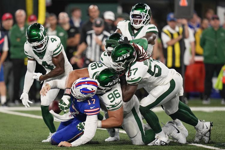 Aaron Rodgers injures Achilles, New York Jets beat Buffalo Bills in overtime
