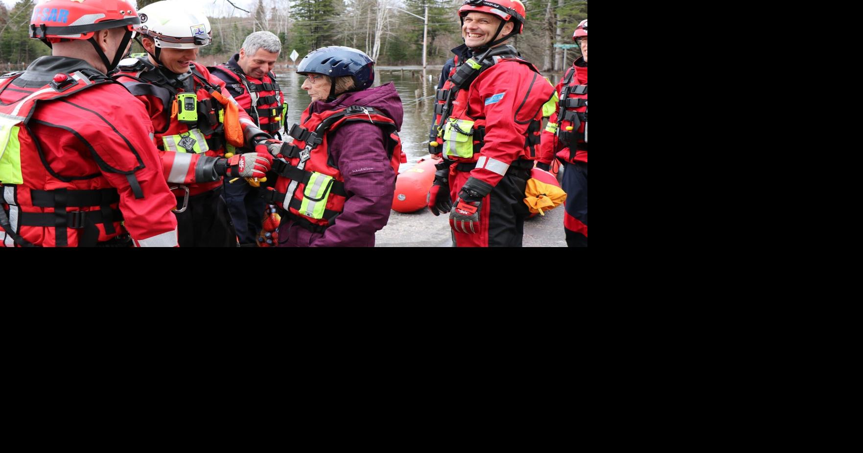 Bracebridge woman carried across flooded Fraserburg Road
