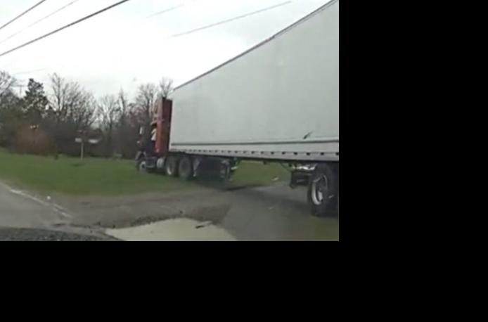 Article ||articlenum||: Brampton Driver Charged After Tractor Trailer Gets Stuck In Front Yard Of Peterborough Home