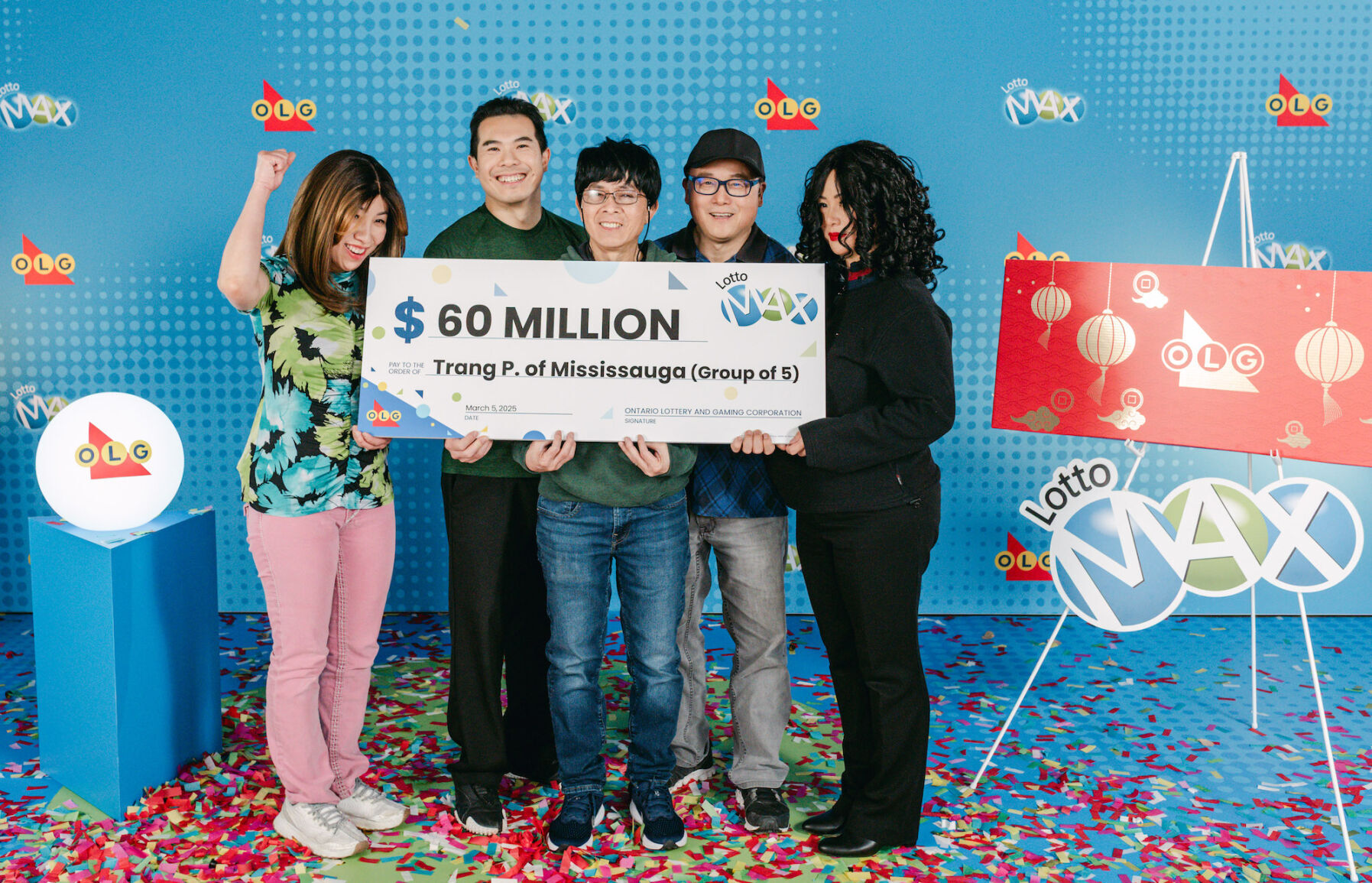Coworkers celebrate $60-million Lotto Max win