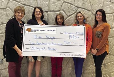 Hollister Schools Foundation board members present a grant check to Mrs. Nangle.jpg