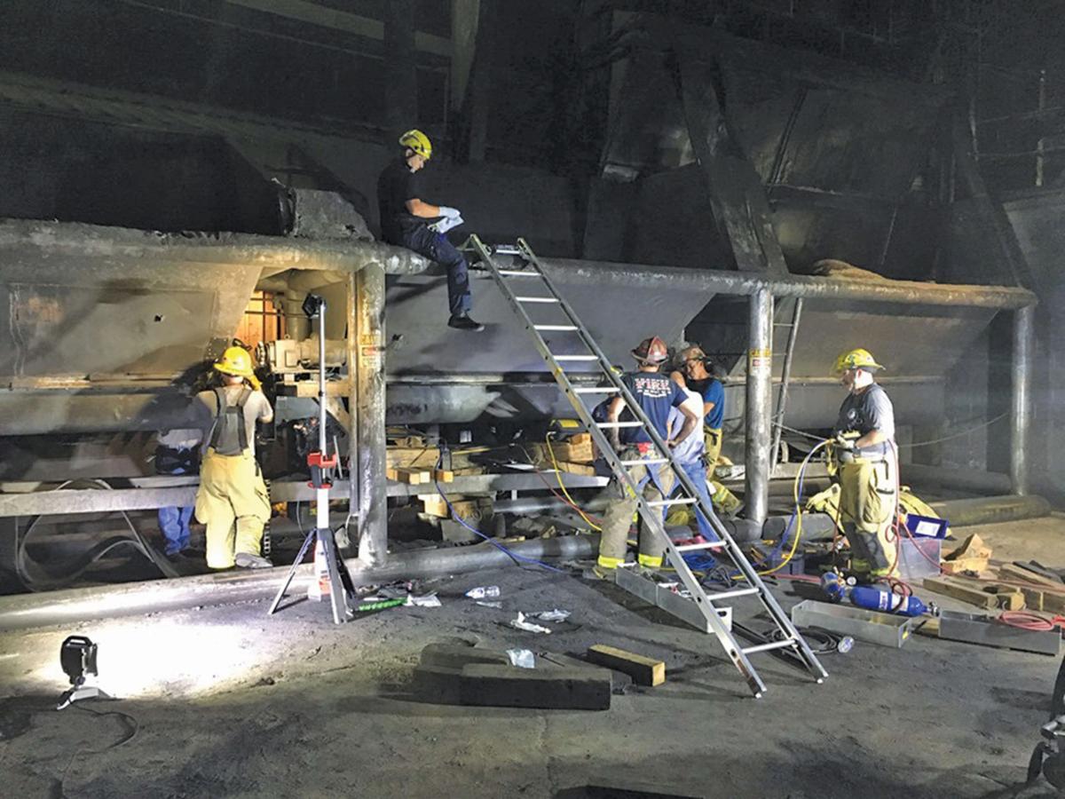 Trapped in an auger, royal oak charcoal employee rescued News Free