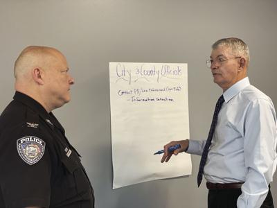 2 Hollister Chief of Police Preston Schmidt and City Administrator Rick Ziegenfuss discuss the police and the city's plan.jpg