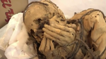 Archaeologists discover 1,200-year-old mummy tied with rope