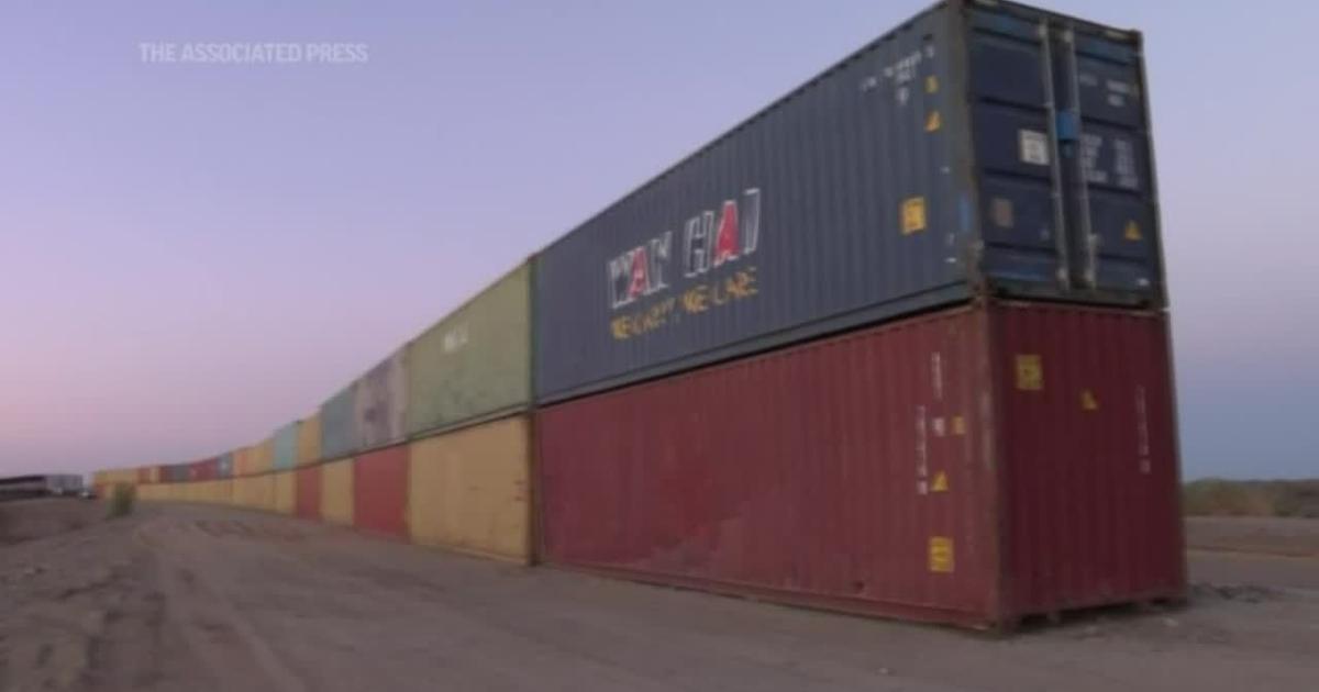 Container Border Migrants bypass AZ shipping container border wall