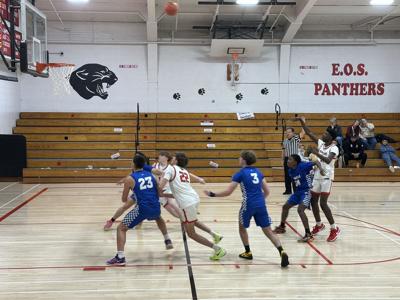 E O Smith Panthers boys basketball defeats Plainville in a nail biter