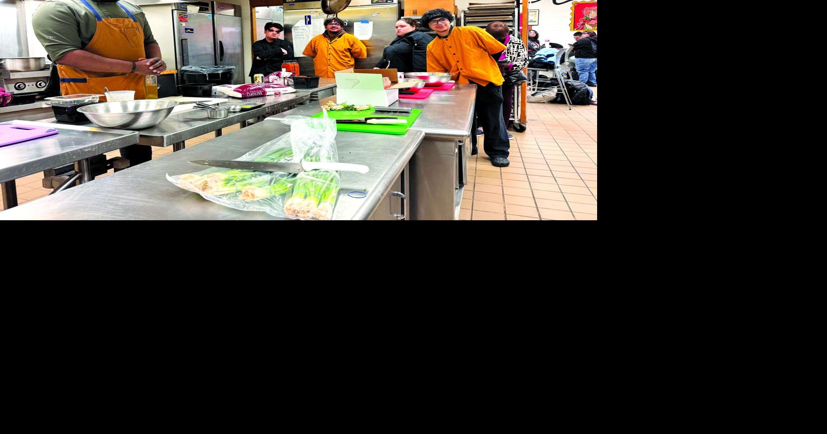 STUDENTS LEARN FROM TV CHEF: Chef Givens Jr. visits New Britain High for hands-on cooking experience