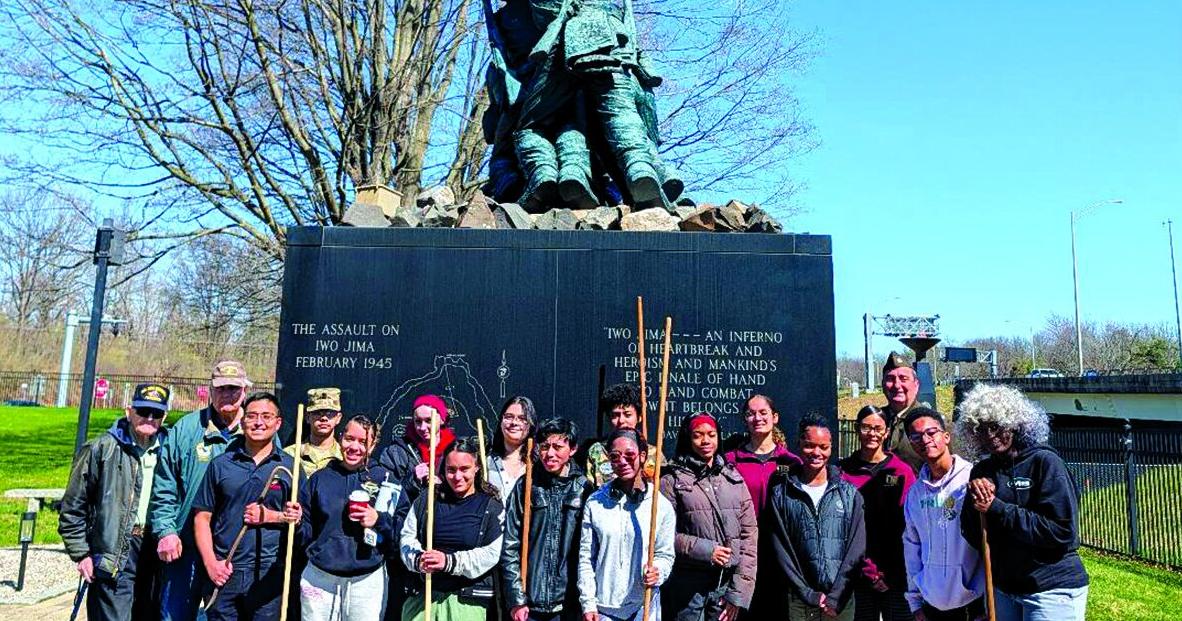 New Britain High students clean the Iwo Jima Memorial