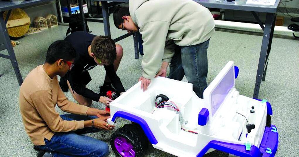 ‘Go Baby Go’ event at PHS gives ride-on cars to special children