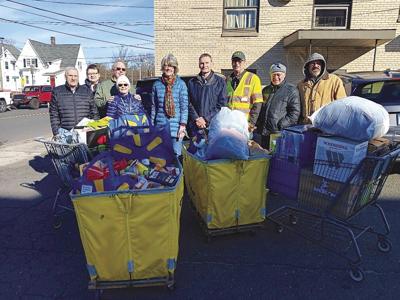 CERT gives two vehicles’ worth of food to Agape House
