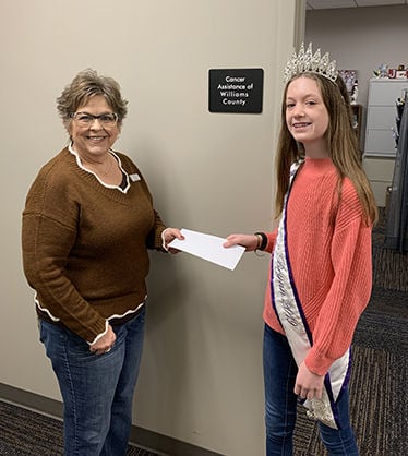 Teen Miss Bryan donates to Cancer Assistance of Williams County