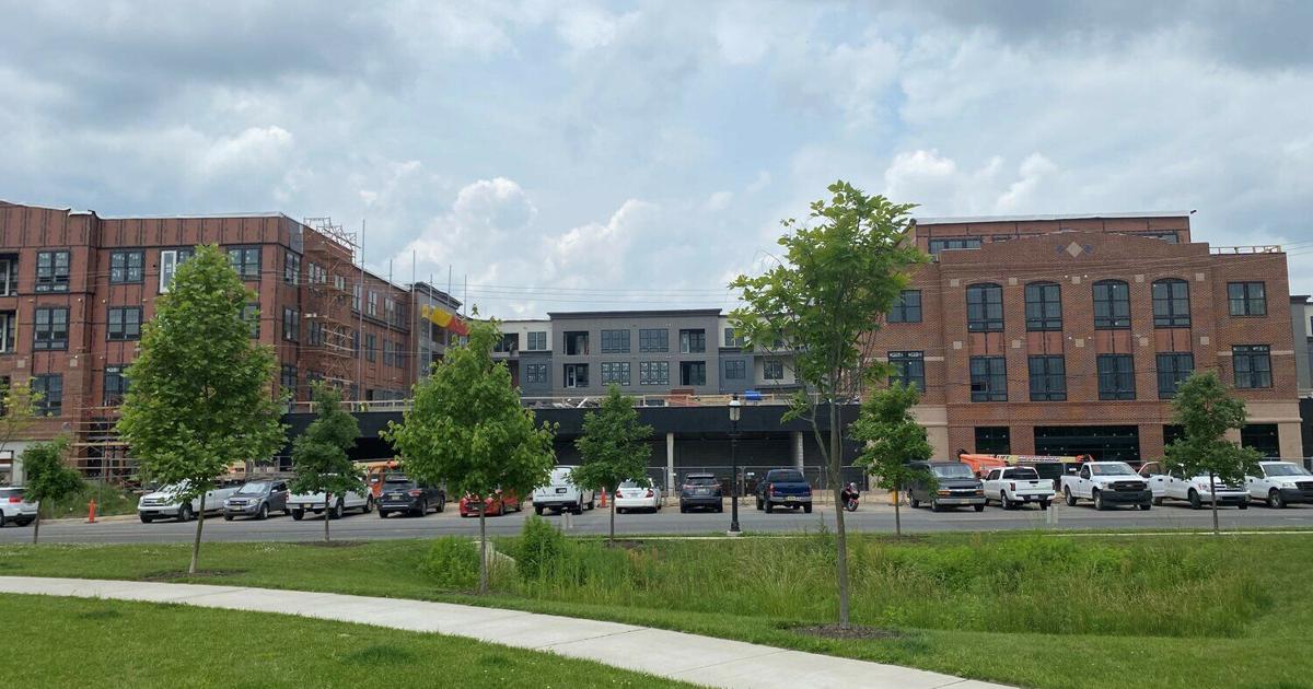 Apartment complex emerging at former newspaper office site in ...