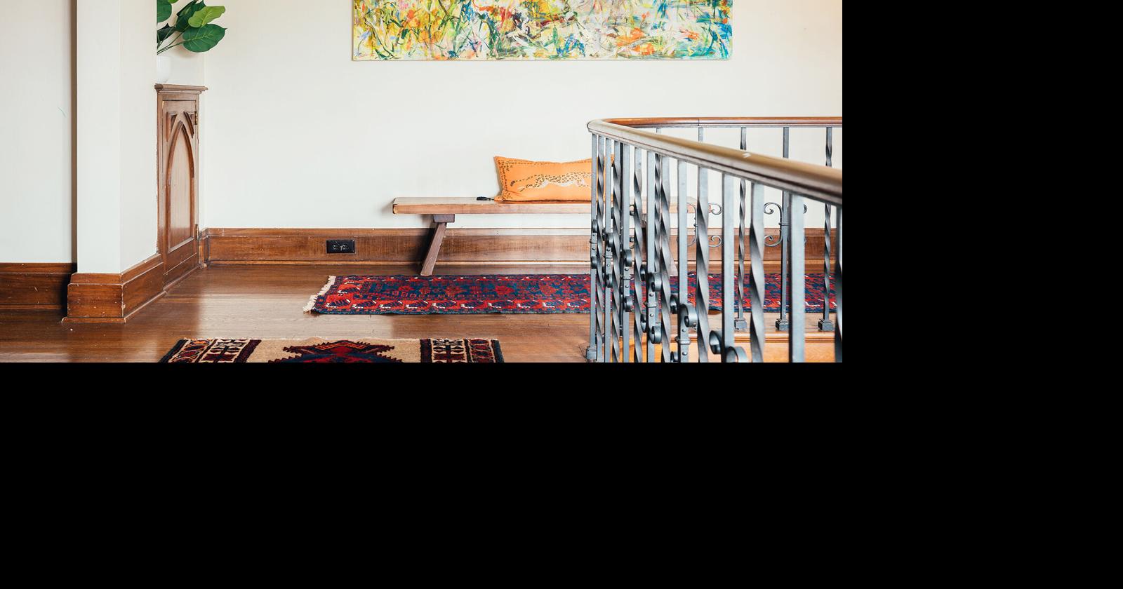 A real Buffalo-area family relaxing together in a cozy living room, enjoying cleaner indoor air at home.