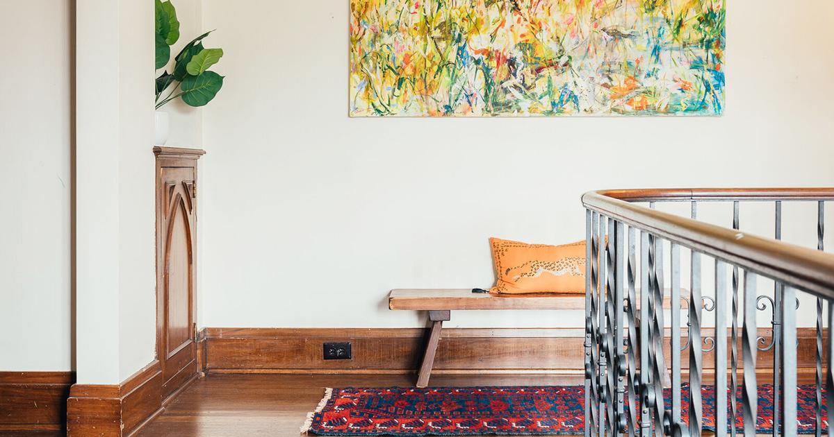 A real Buffalo-area family relaxing together in a cozy living room, enjoying cleaner indoor air at home.