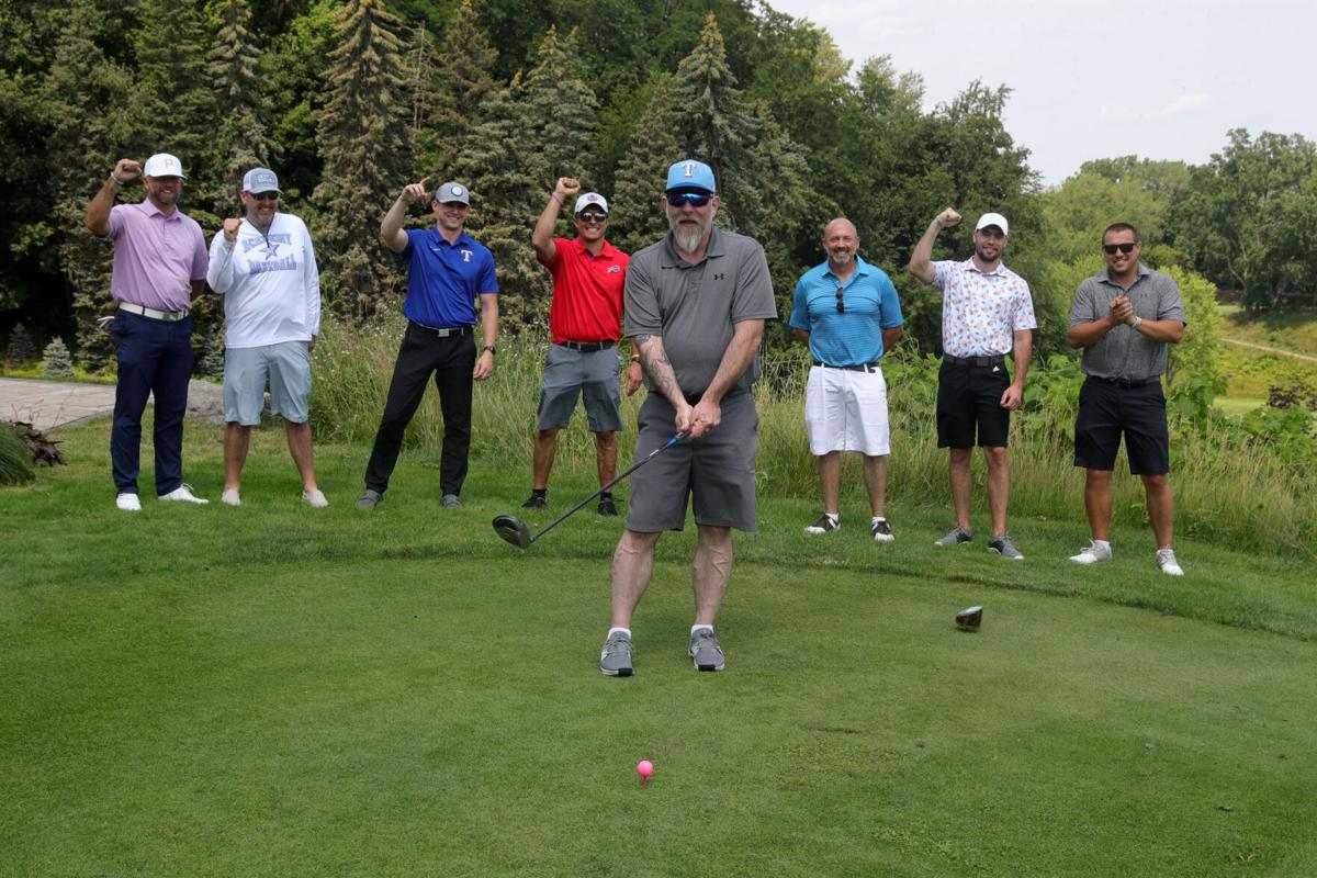 Jamie Heim takes his son Jonah's friends and coaches golfing