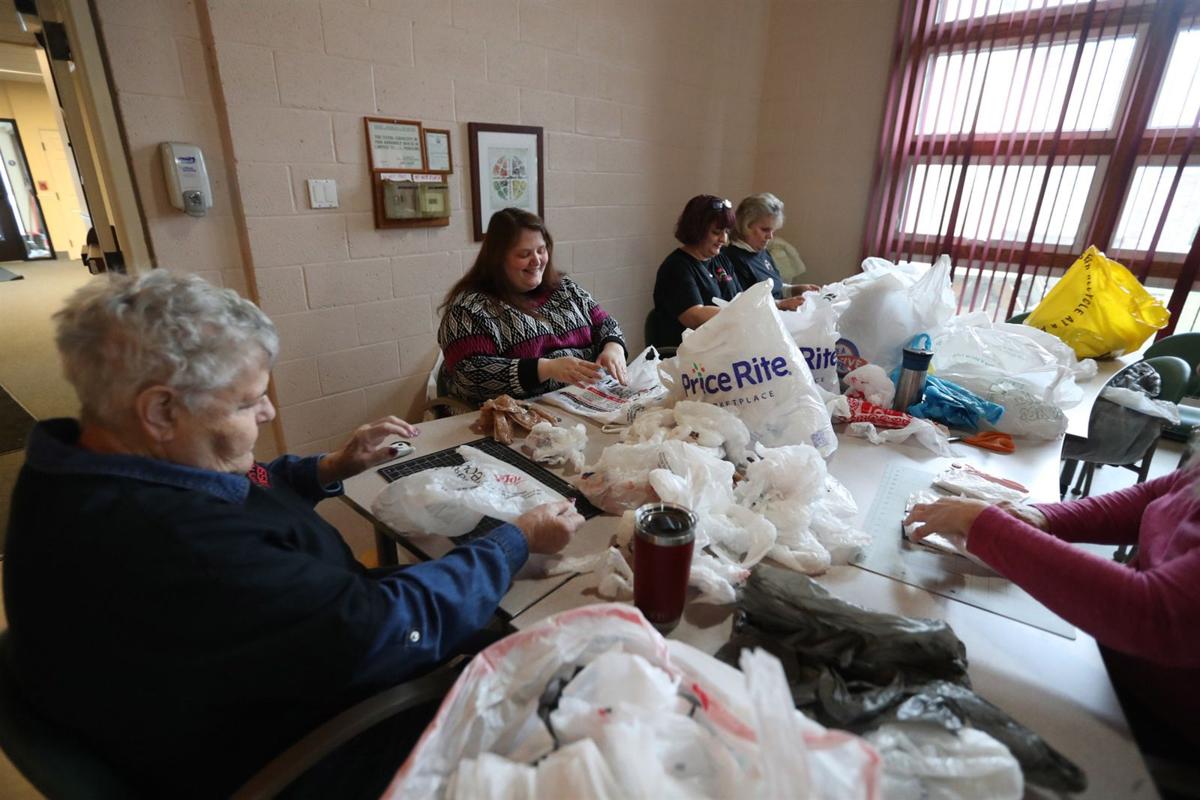 Recycling plastic bags into sleeping mats for the homeless