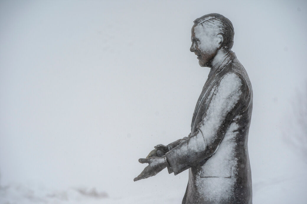 Ralph Wilson statue at Buffalo Bills Stadium in black and white