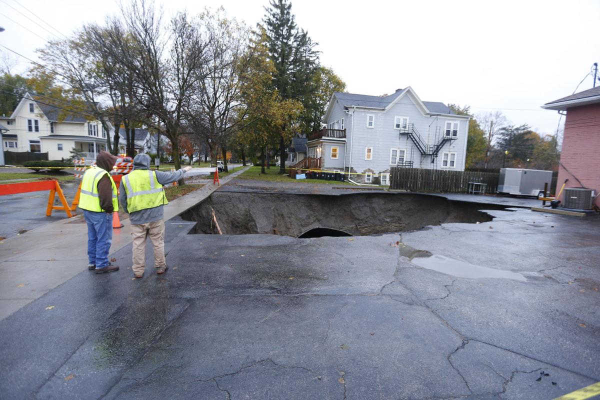 Giant Sinkhole Opens In East Aurora Parking Lot Local News Buffalonews Com