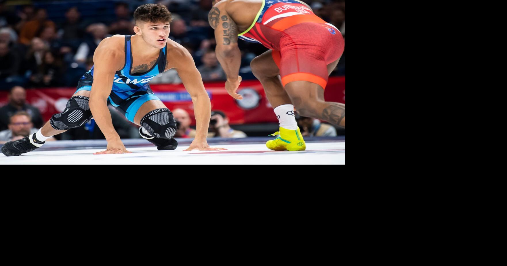Alex Facundo (left) wrestles Jordan Burroughs in a 74-kilogram men's freestyle challenge round quarterfinal bout during the U.S. Olympic Team Trials at the Bryce Jordan Center April 19, 2024, in State College. Burroughs won by decision, 5-3.