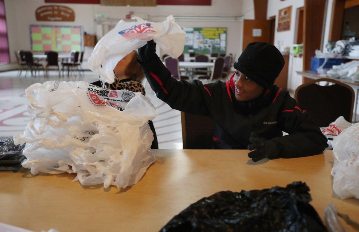 Recycling plastic bags into sleeping mats for the homeless