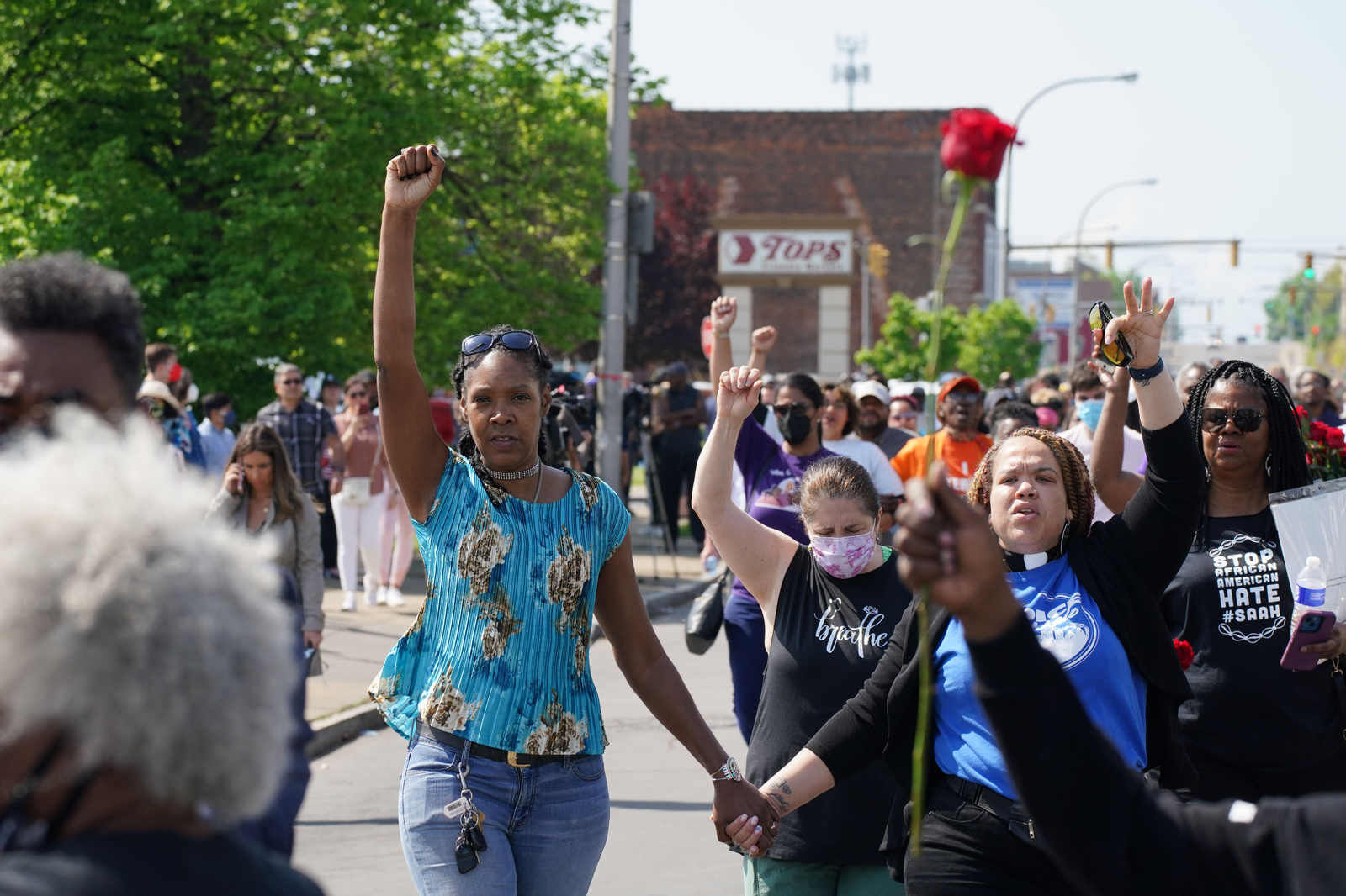 Community holds vigil, protests in wake of racially motivated mass