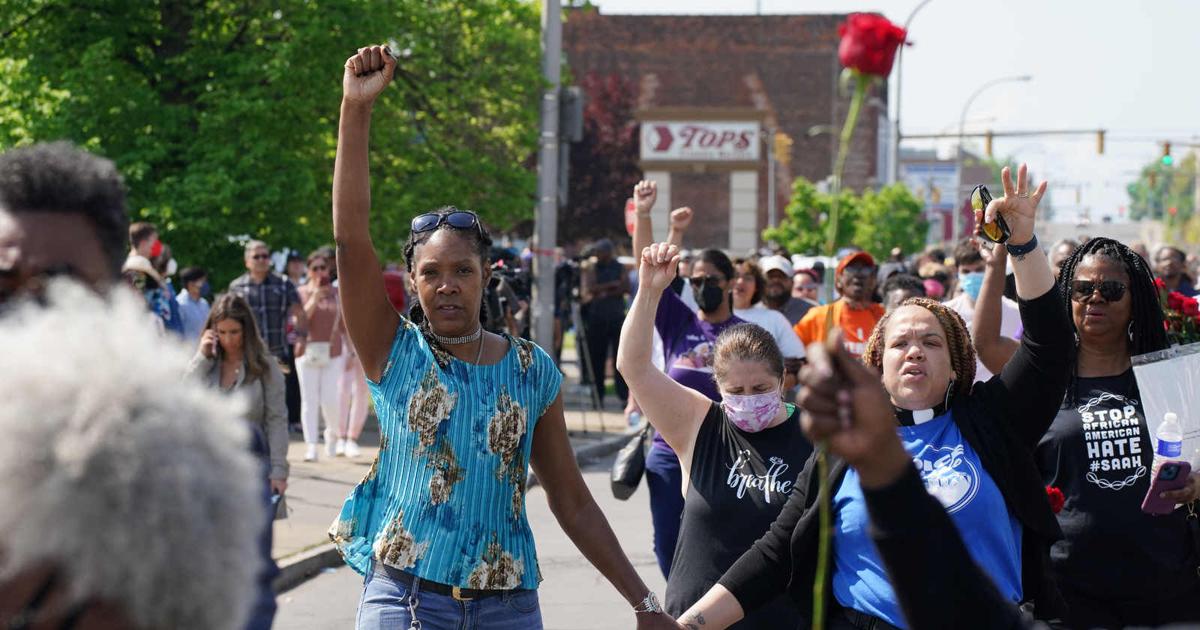 Community holds vigil, protests in wake of racially motivated mass shooting