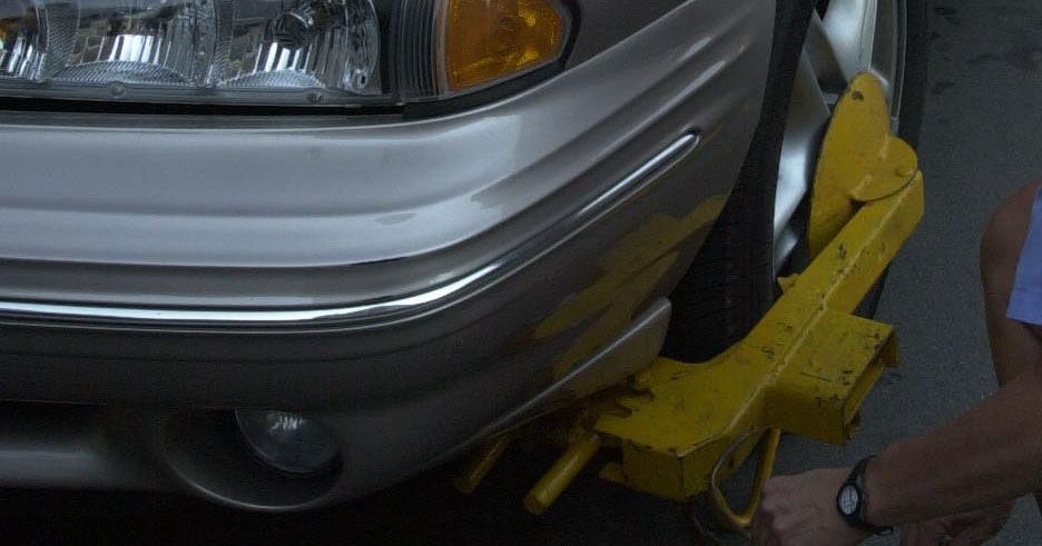 Council looking to crack down on 'predatory booting' in parking lots