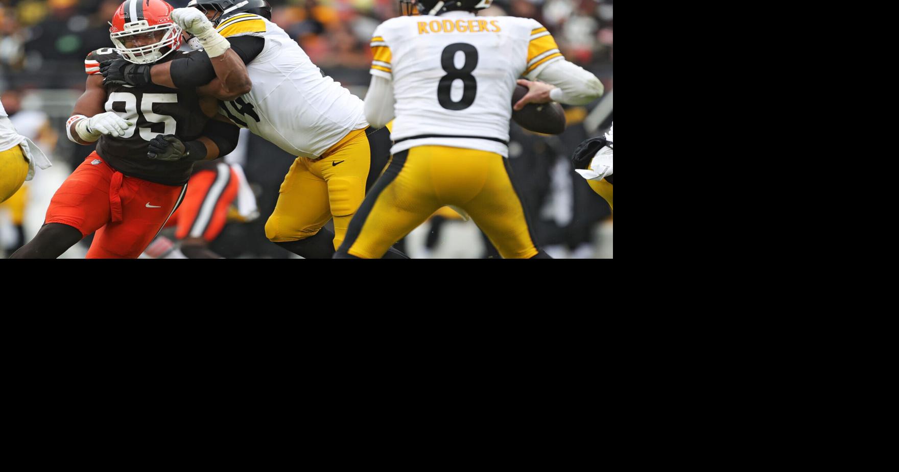Cleveland Browns defensive end Myles Garrett (95) tries to get past Pittsburgh Steelers guard Spencer Anderson (74) as quarterback Aaron Rodgers (8) looks to throw during the second half of an NFL football game at Huntington Bank Field, Dec. 28, 2025, in C