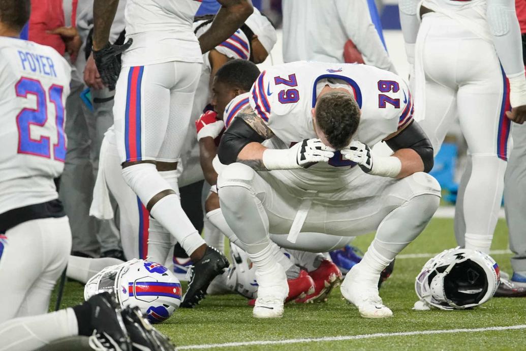 Photos: Buffalo Bills players, fans gather to pray after Damar Hamlin ...