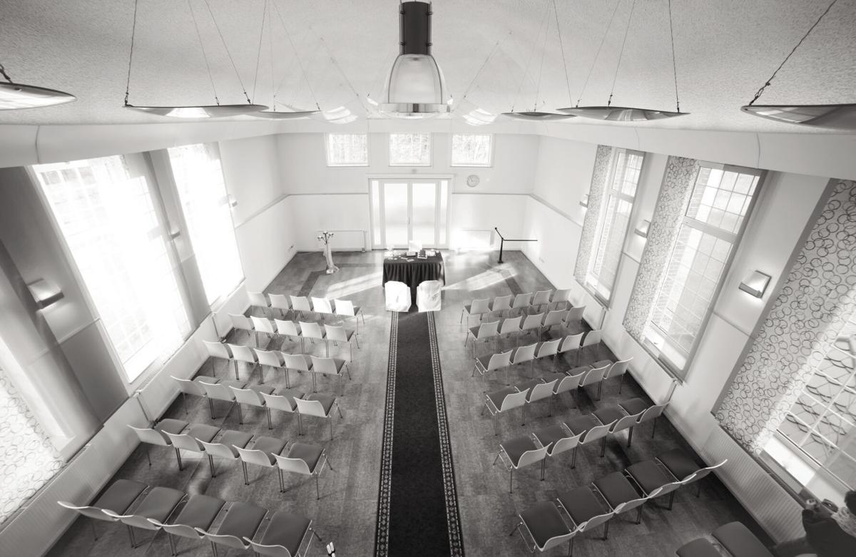 symmetric wedding reception hall awaiting guests and bride and groom