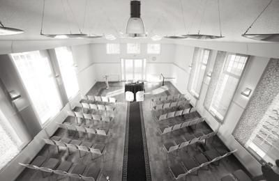 symmetric wedding reception hall awaiting guests and bride and groom