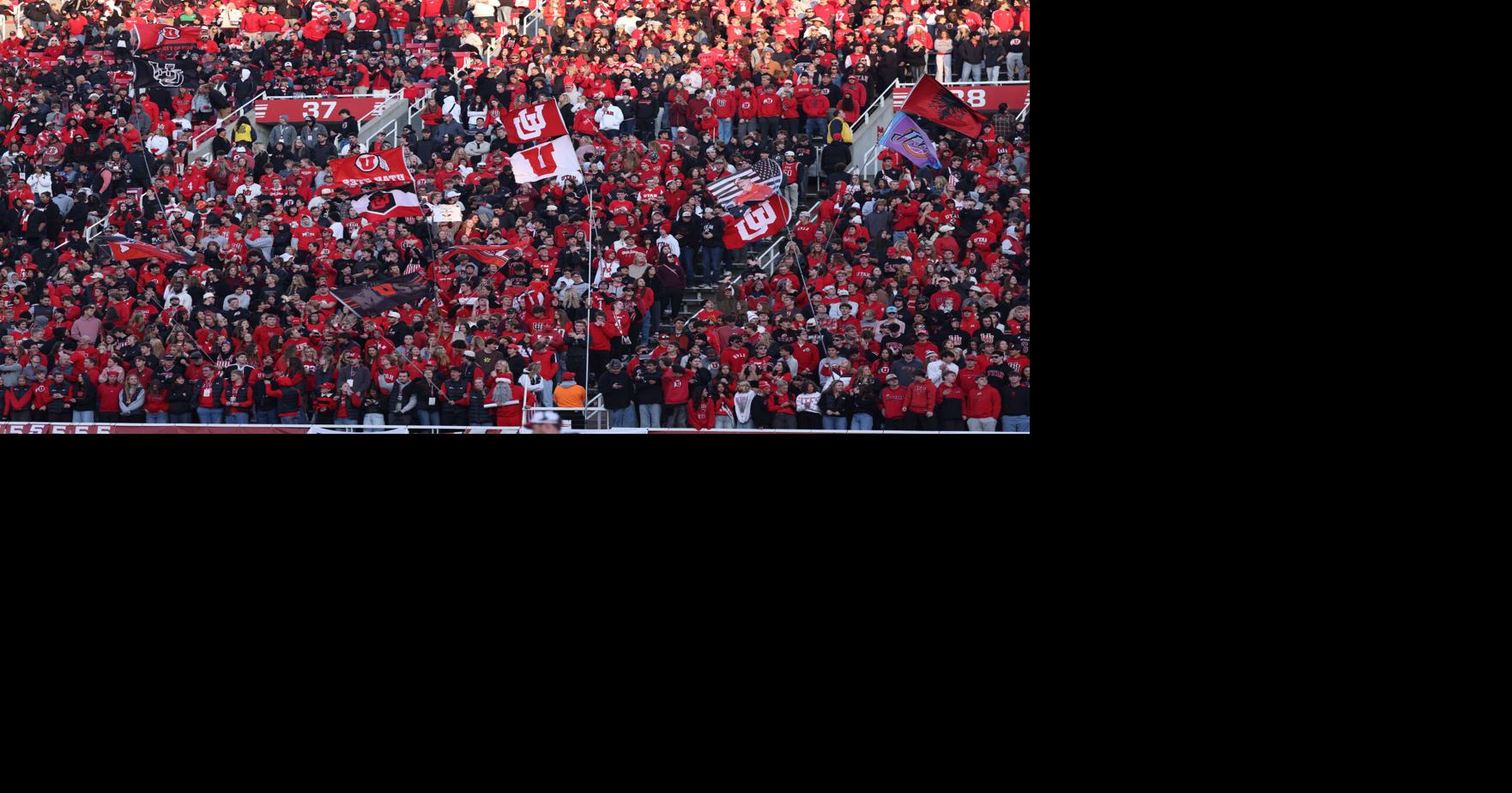 Utah Utes fans celebrate a touchdown against the Kansas State Wildcats during the second half at Rice-Eccles Stadium.